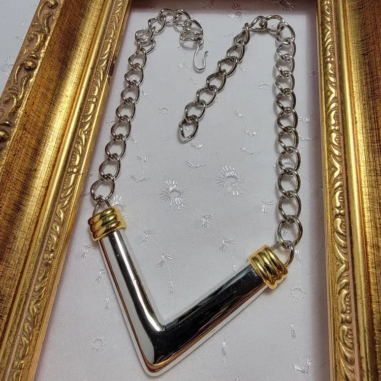 #01 Monet Bold V-Shaped Silver and Goldtone Chain Necklace