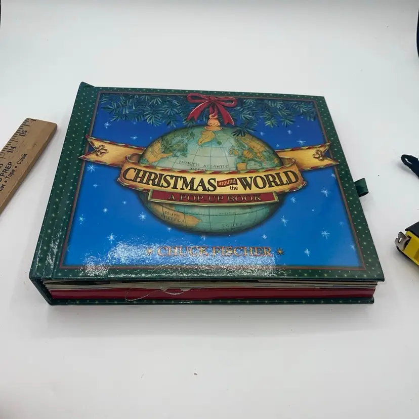 Christmas Around the World: A Pop-Up Book Chuck Fisher History Tradition Travel