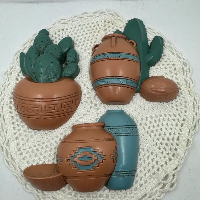 Vintage Burwood Southwestern style molded wall decor set with cacti and pots.