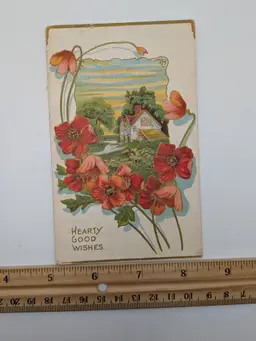 E108. Antique Postcard "Hearty Good Wishes" Embossed Florals Cabin Gold