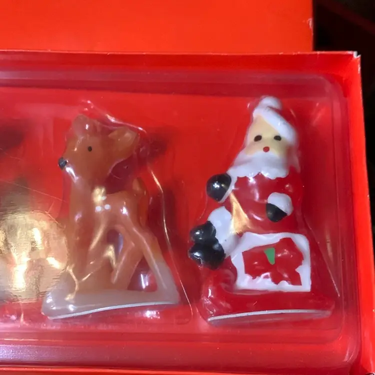03. The Vermont Country Store Santa And Reindeer Candle Set Of Five.