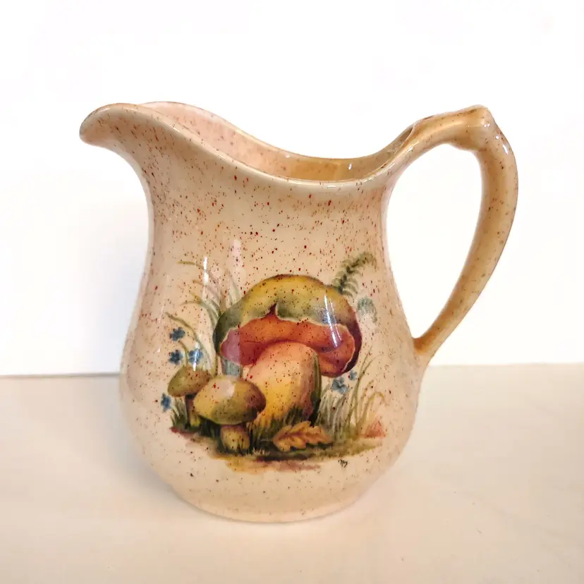 Vintage mushroom pitcher. 5.5 inches tall. No chips or cracks.