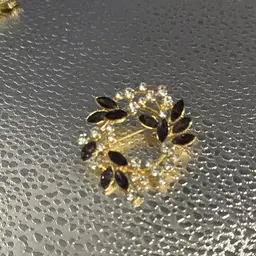 Gorgeous Brooch Wreath With Purple And Faux Diamond Stones