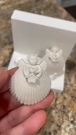 Porcelain Shell Angel Ornaments titled 'Gardening Friends' by Margaret Furlong