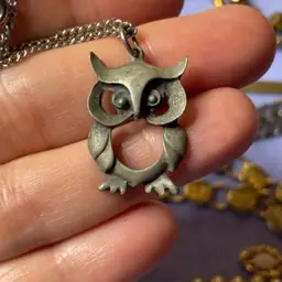 Silvertone owl on a chain