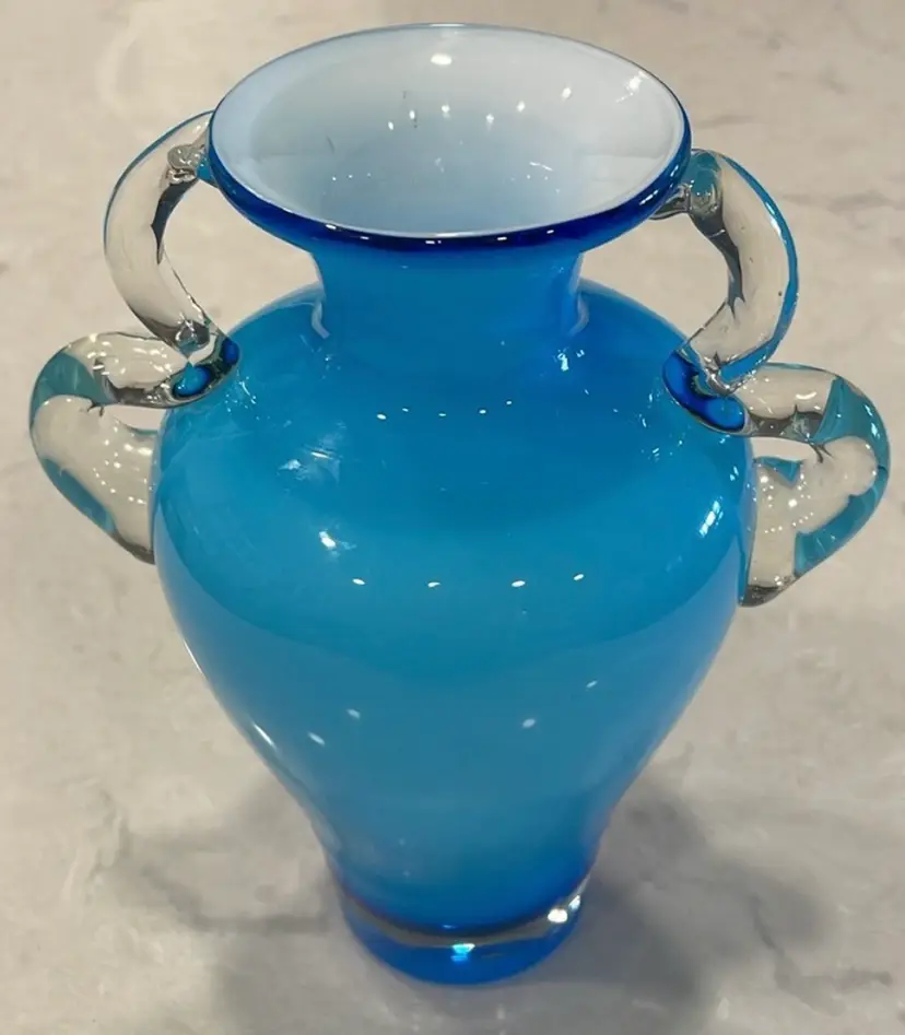 Beautiful, cased, glass, turquoise/blue urn/vase with applied handles. Nice display piece! (Some little marks inside rim, as shown) Roughly 8.25” X 6”