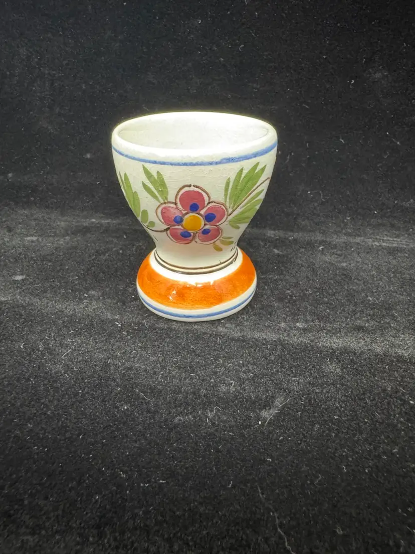 Hand-painted Delftware egg cup with floral motif