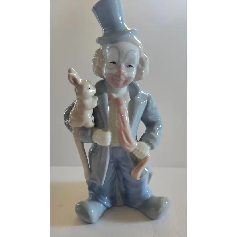 #01 - Vintage Clown and Bunny Porcelain Figurine, 9.5" tall, 5" wide and 4" deep.