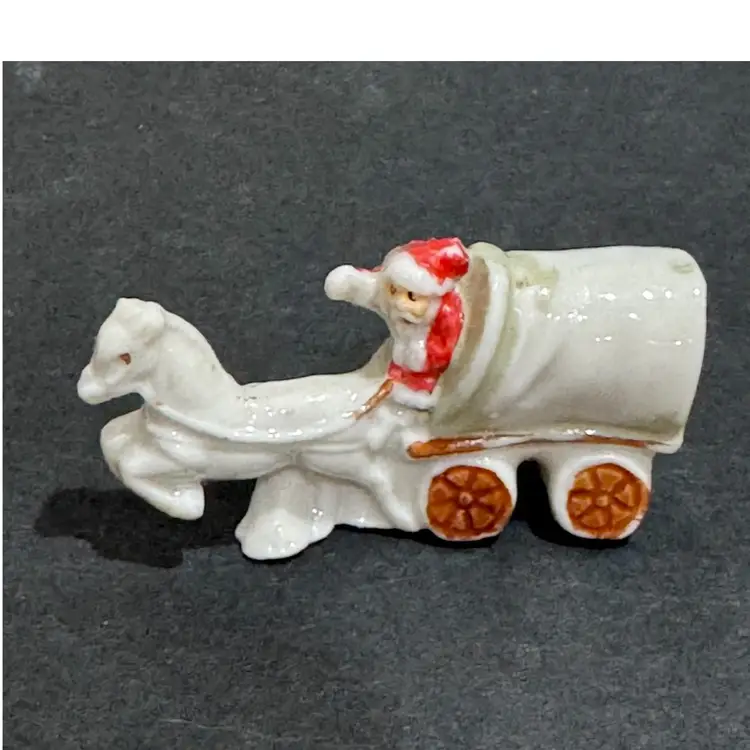 Tiny Santa In A Wagon