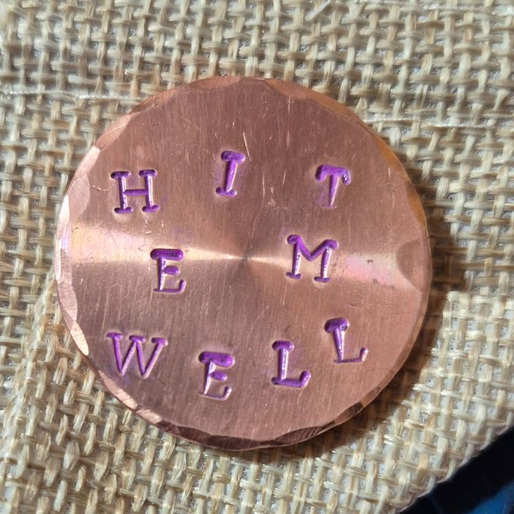 Golf Ball Marker - 1.25 inch diameter - Hit 'em well - Purple Lettering - copper