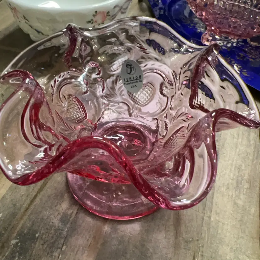 Vintage Fenton pink glass compote with ruffled edge and Strawberry pattern.