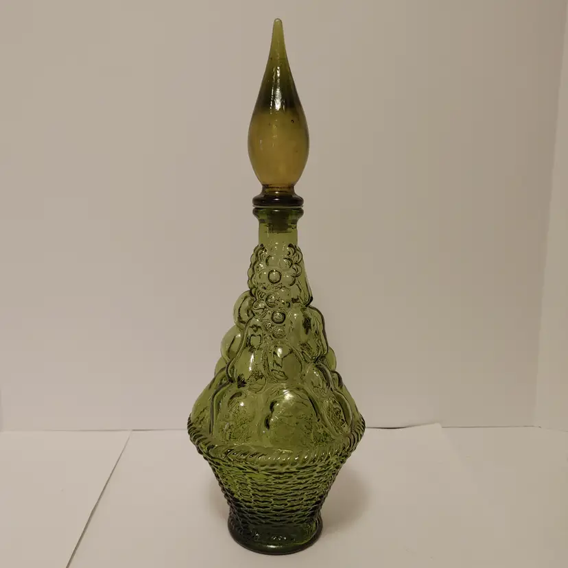 Vintage Empoli green Genie Bottle with fruit basket. Made in Italy. 1 crack on stopper. See pics.