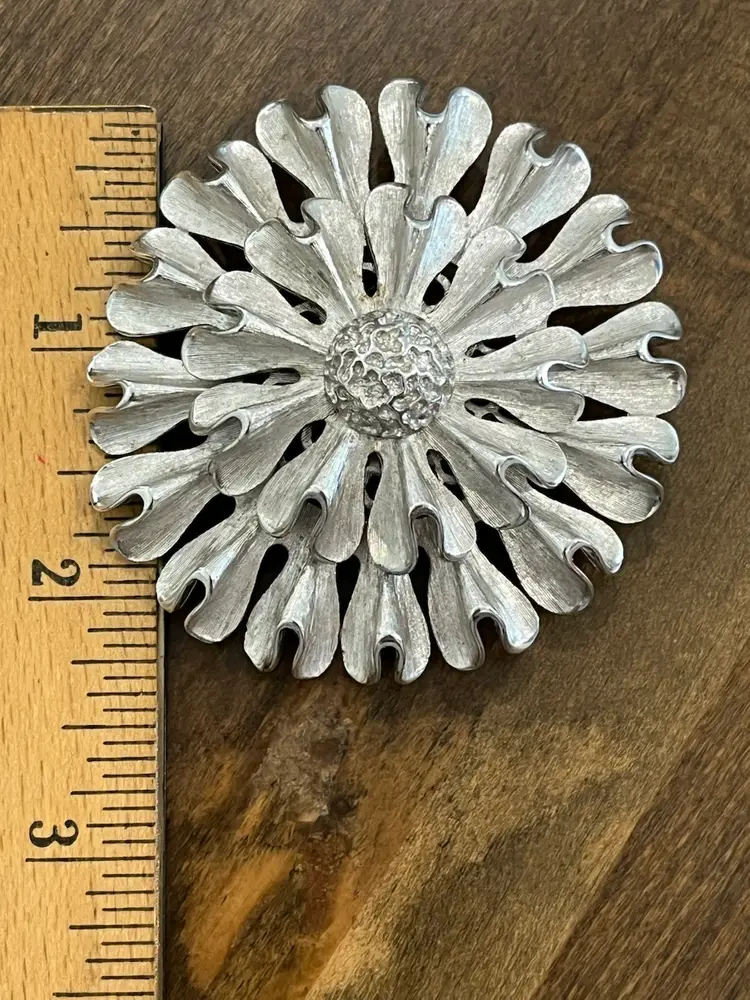 Vintage Textured Monet Silvertone Flower Brooch