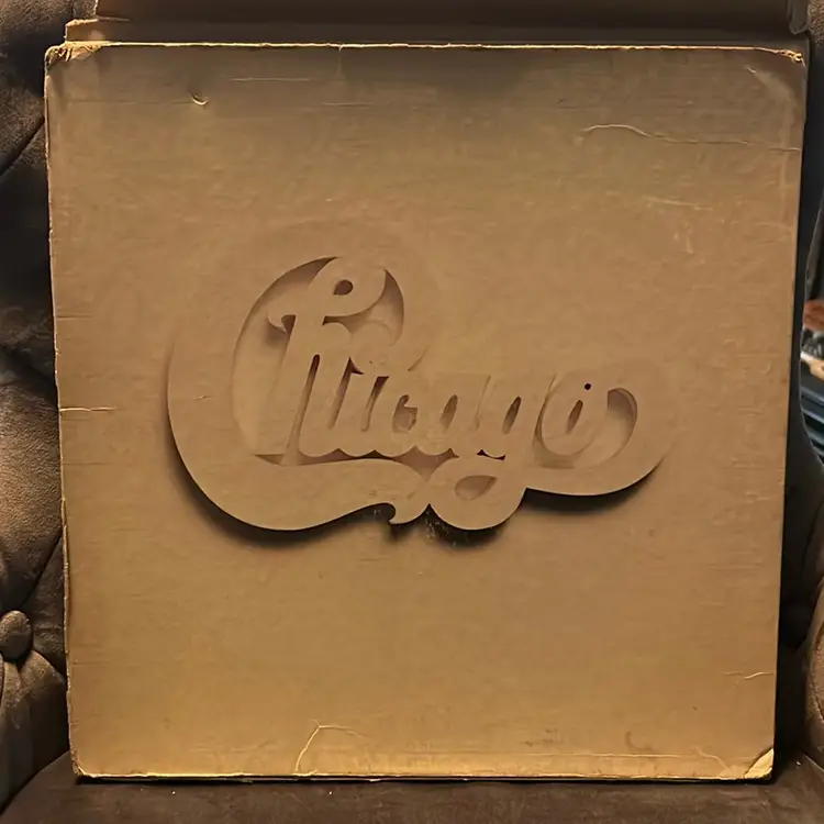 Chicago 1971 Live At Carnegie Hall Four Lp Box Set

Well Loved Set Has Damaged Box And Some On Lps. 