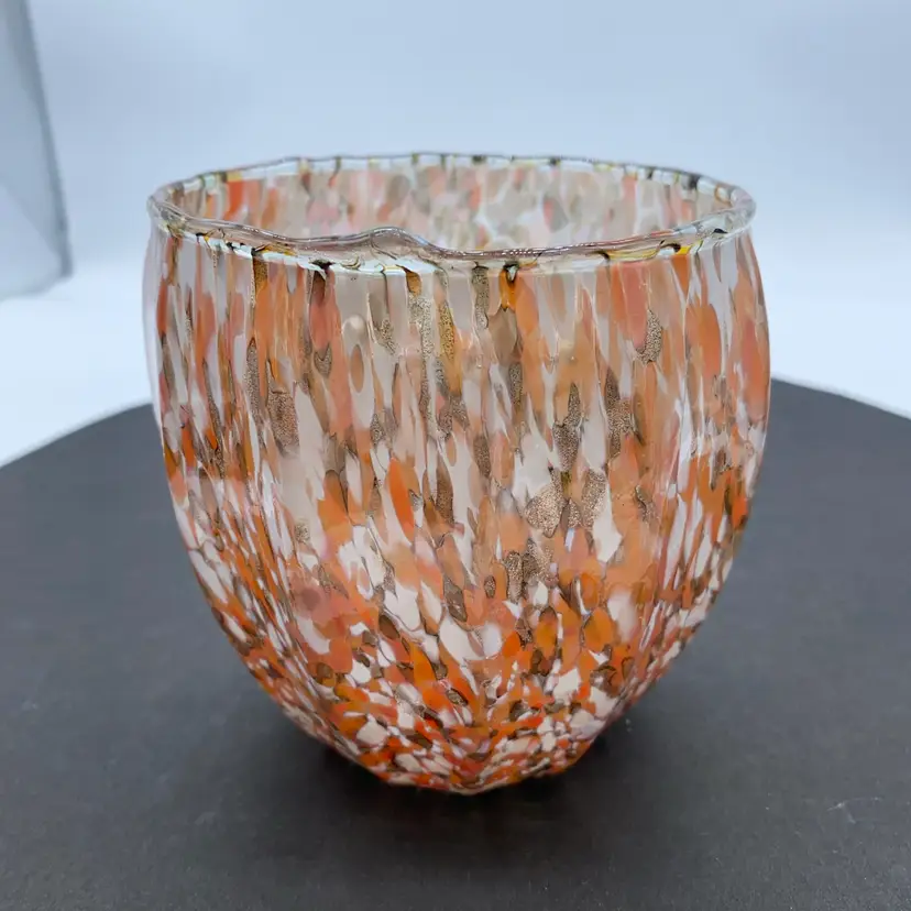 #1226 A contemporary murrhina splatter art glass Vase Or Tealight holder with an irregular rim.