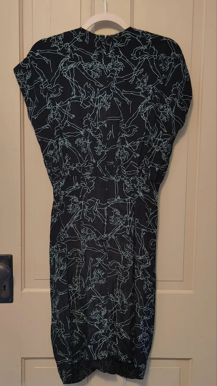 Dress- Brand: Nicole Miller. Size 6. NWT. Retail $234. Black & teal sheer dress. Material- unknown. No callouts.
