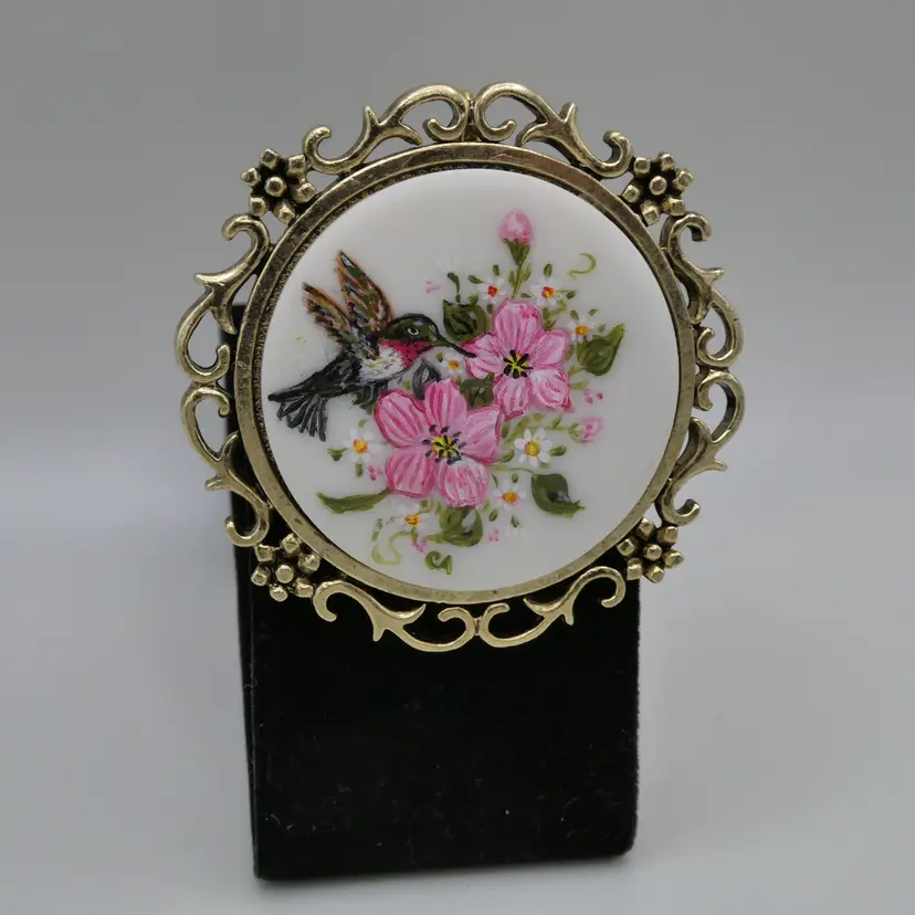 Vintage Hummingbird Pink White Flowers Brooch Pendant Hand Painted Milk Glass Cabochon Gold Tone Signed 2"