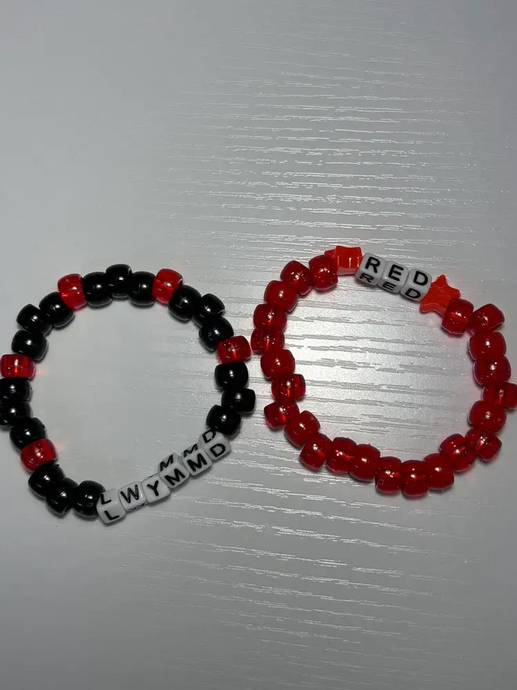 “Red” And “LWYMMD” Friendship Bracelets
