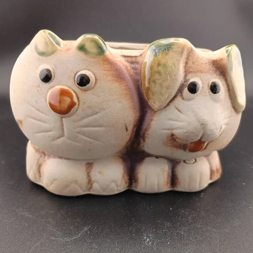 Pottery planter, dog and cat