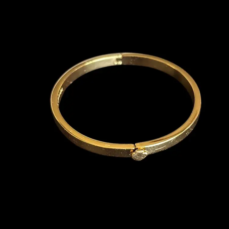 Kate Spade  Gold Tone Clasp Bangle