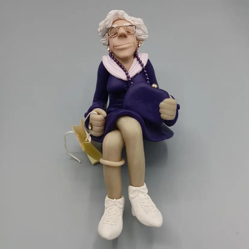 #110 - Diana Manning "Born To Shop" Polymer Clay Type Shelf Sitter With Rhinestones.