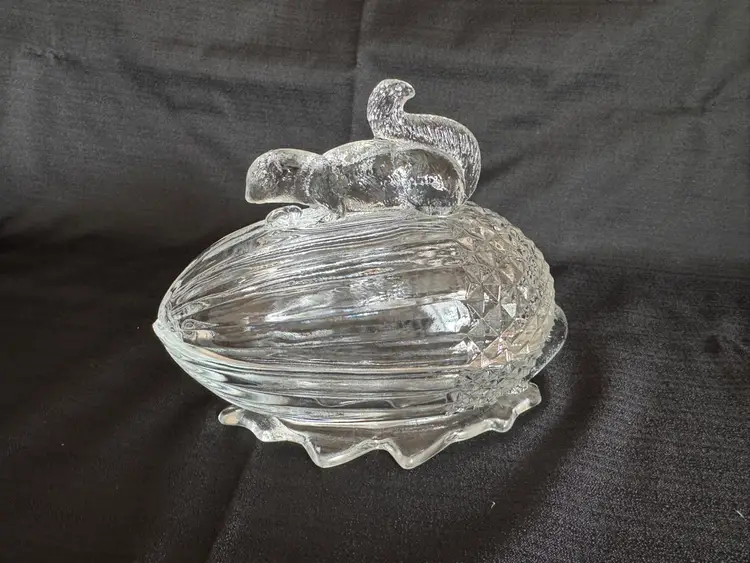 L E Smith Squirrel On Acorn