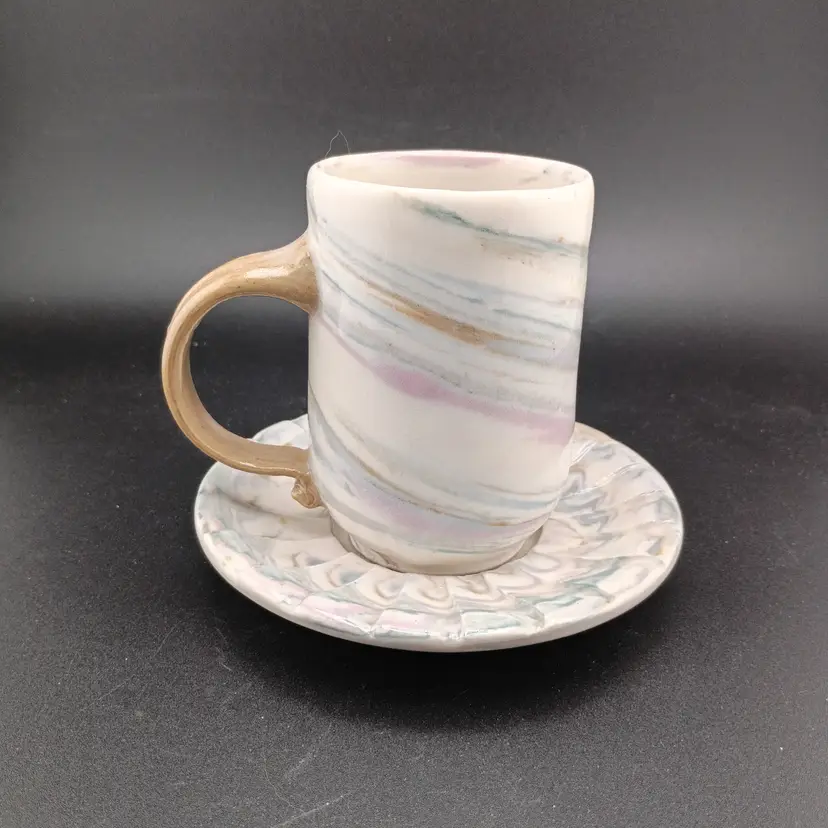 Signed studio pottery cup and saucer