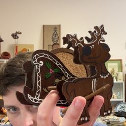 Vintage wooden reindeer and sleigh coaster set