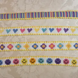 New Lot of Multi Color Cross-stitched Ribband Trim; flowers, hearts, smiley faces, and stripes