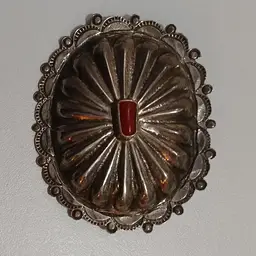 Cool Concho Shaped Silver Pin With Coral Embellishment