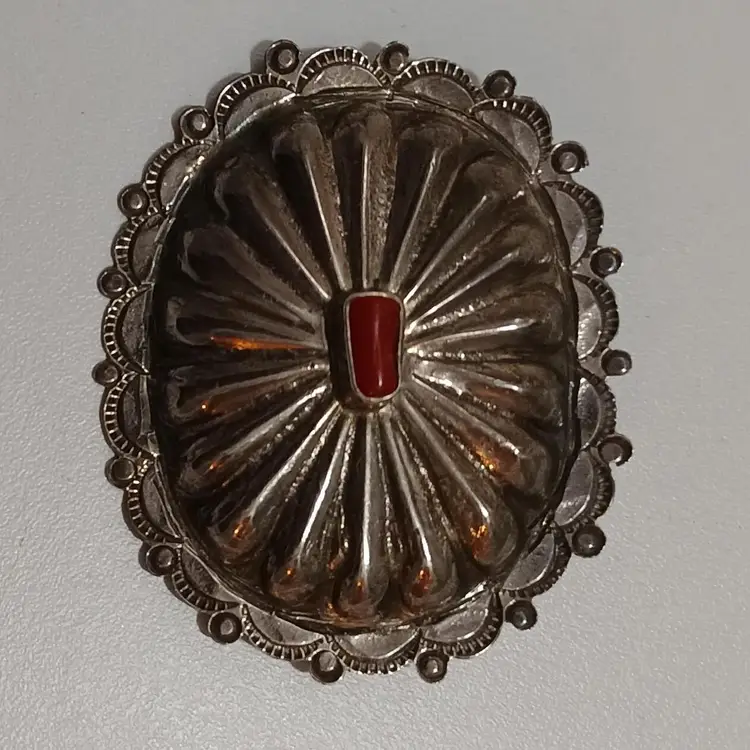 Cool Concho Shaped Silver Tone Pin With Coral Embellishment