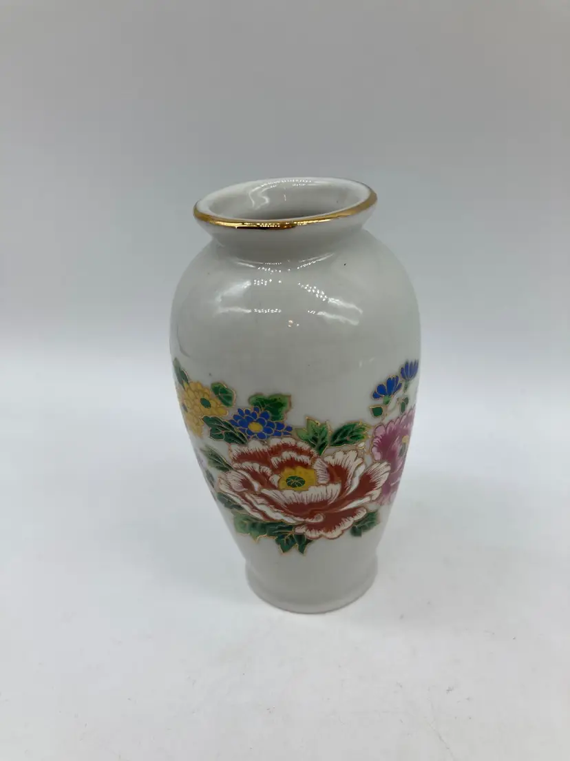 white ceramic vase, colorful peony floral pattern and a gold-trimmed rim
