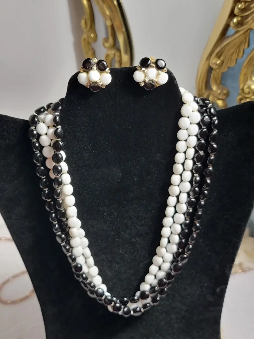 West Germany Demi-parure set of 4 strand milk glass necklace and clip-on earrings