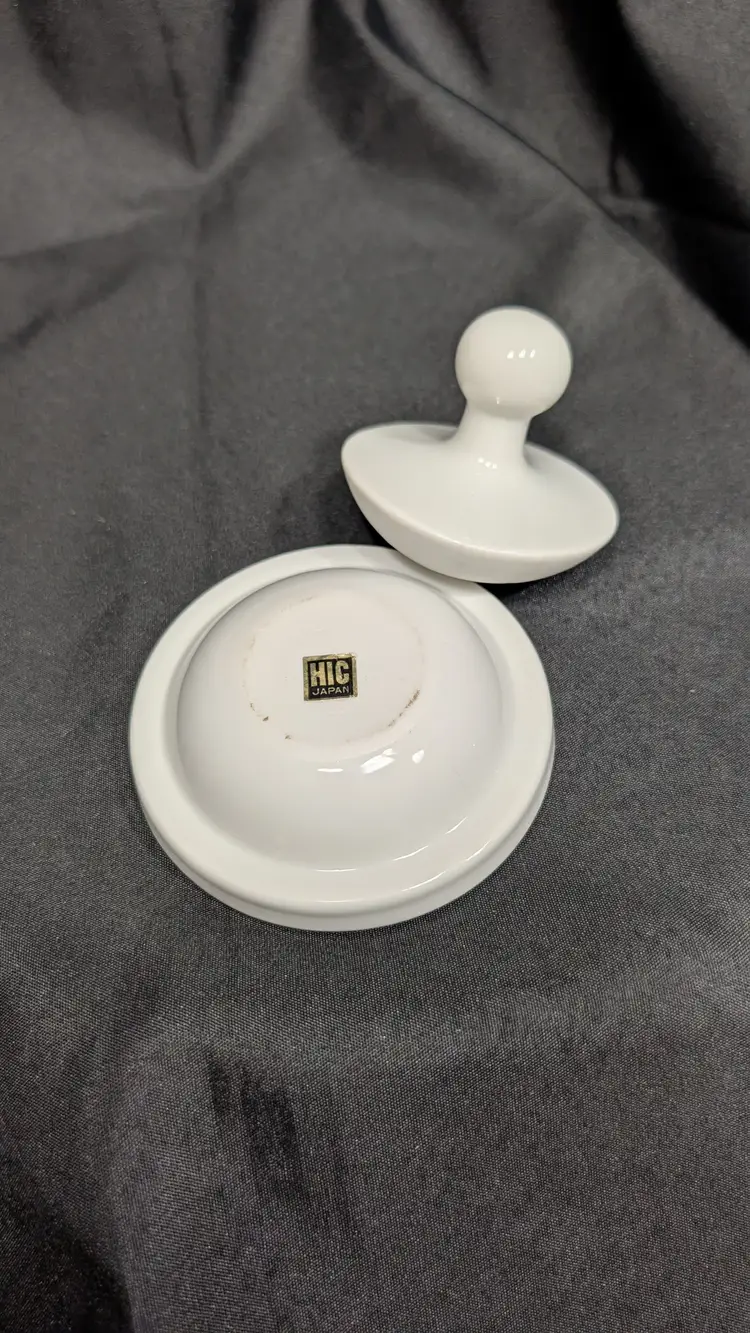 HIC Japan pottery butter press with a white glossy glaze