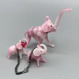 Vintage Pink Glass Miniature Elephant Mom and Chained Babies with Trunks Up - READ