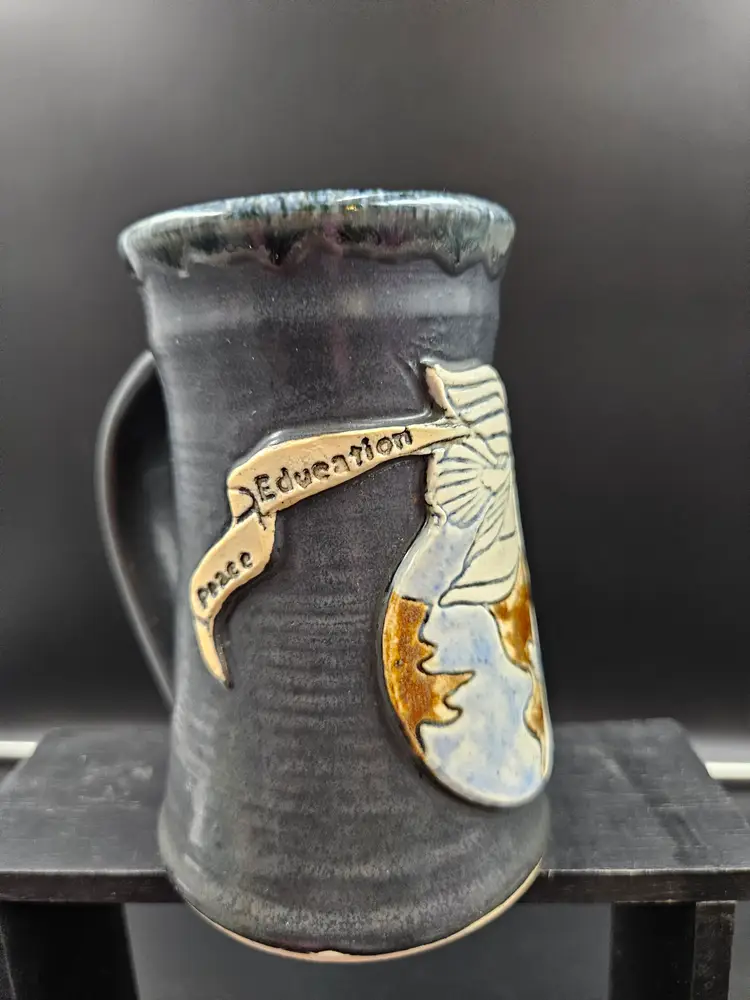 PEACE EDUCATION studio pottery mug, signed