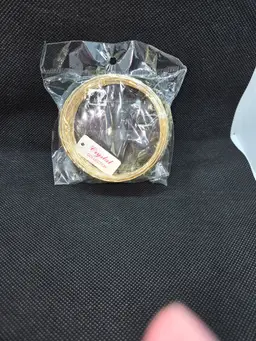 Set of gold tone metal 3 in bangle bracelets new in package