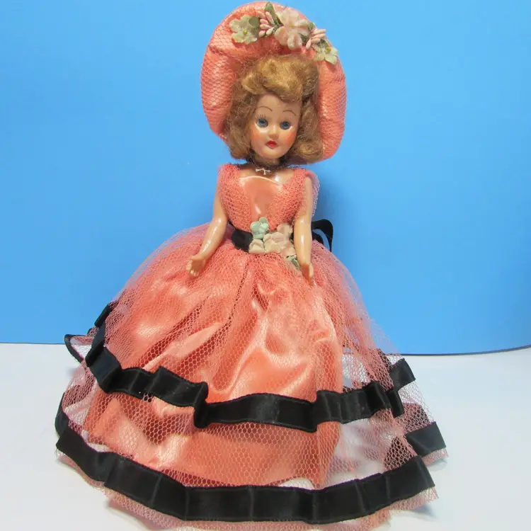 vintage plastic doll in pink gown and hat, sleepy eyes blonde hair 7" girl