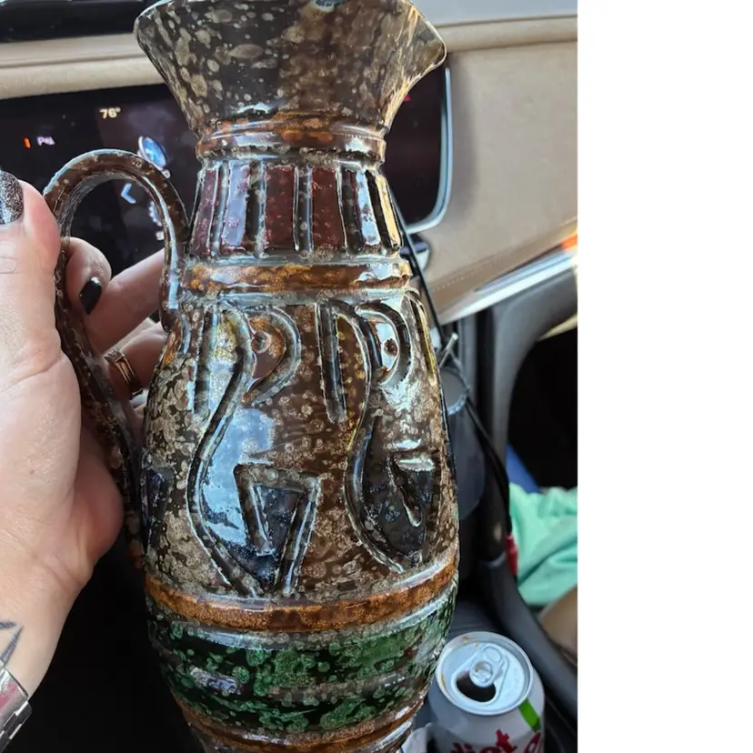 Italian pottery pitcher sgraffito detailing with lava glaze