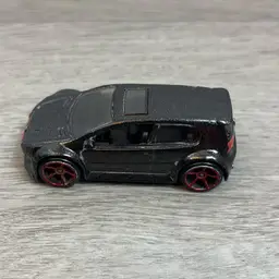 VW Golf GTI Matchbox 2009 Dark Gray Red Rims