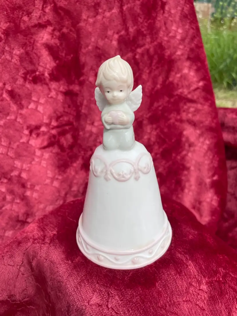 Vintage white glazed porcelain angel bell