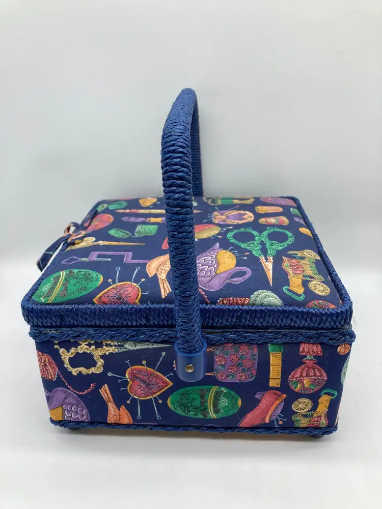 Blue fabric sewing box with notions inside