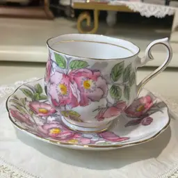36. Royal Albert "Dog Rose" bone china teacup and saucer set from the "Flower of the Month" series Made in 1950’s