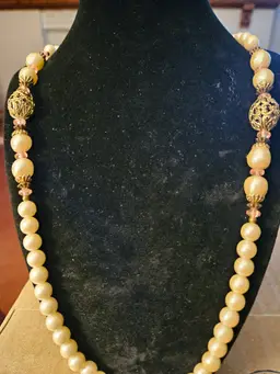 Pearl and gold tone beads