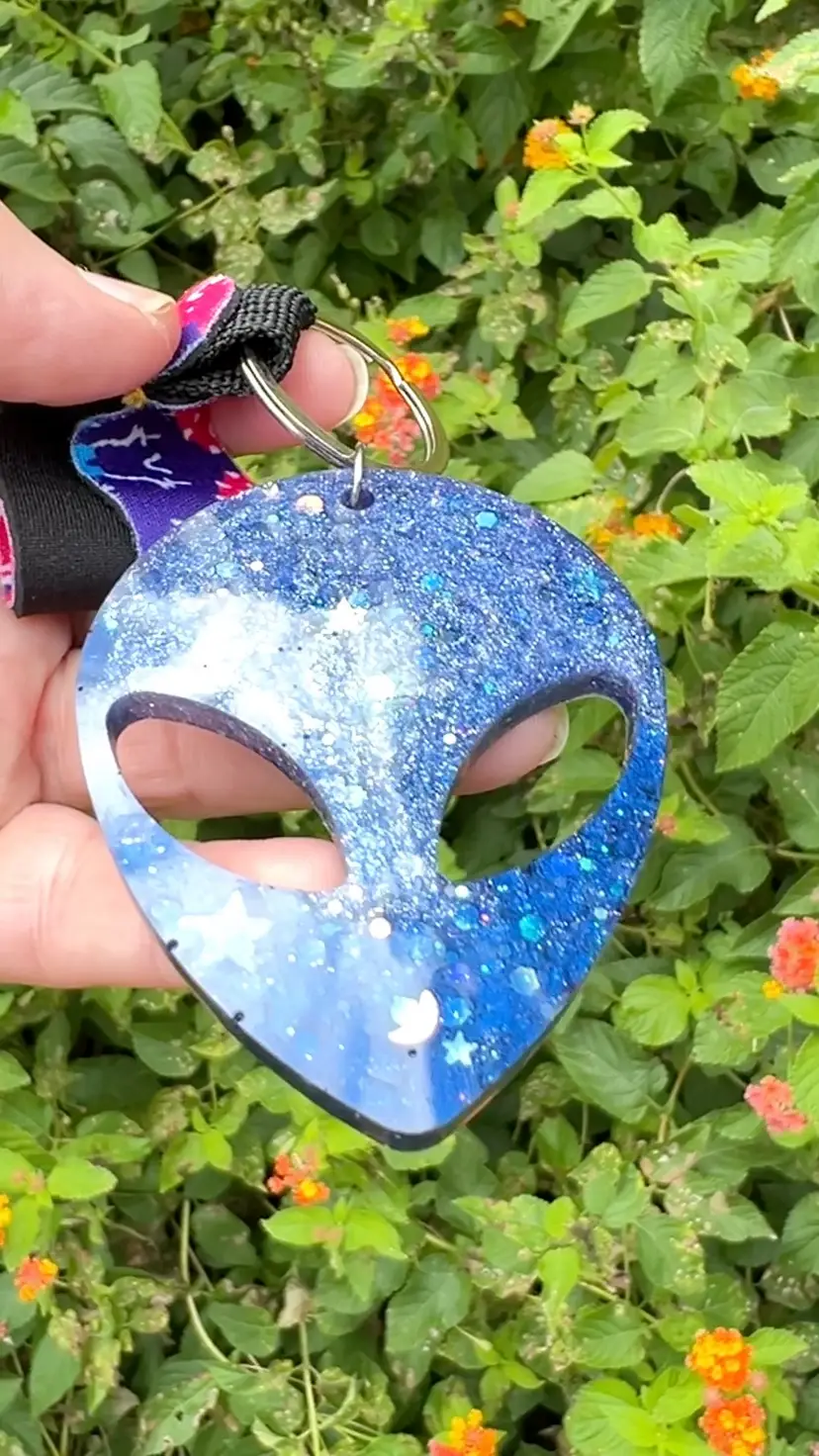 Peaceful Alien 👽 Keychain. Jim’s head is 3” long x 2-1/4” wide cause he’s an 👽.  Jim + Fabulous 🌈 Keychain lanyard 8-3/4” .