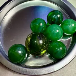 Green Marbles Including Shooter