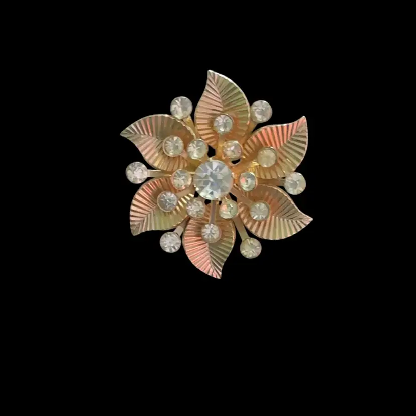 #8. Vintage Goldtone Coro Floral Flower Textured Brooch. With  Clear Glass Rhinestones.