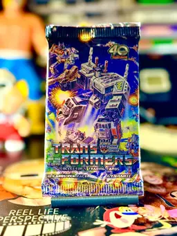 1x 2024 Transformers 40th Anniversary | Collector Trading Foil Hobby Card Pack by Dynamite Cards.