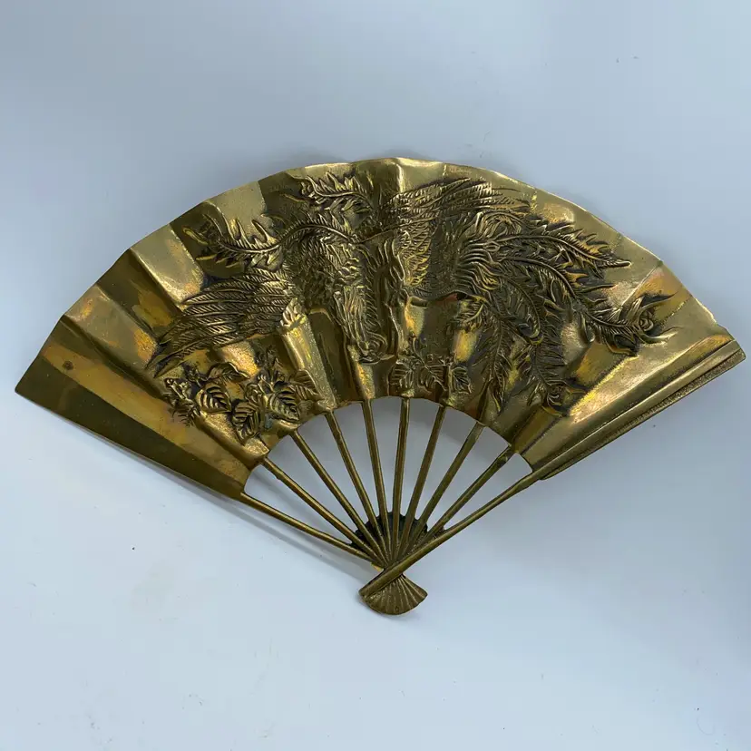 #3513b Vintage solid brass decorative fan with dragon and floral relief.