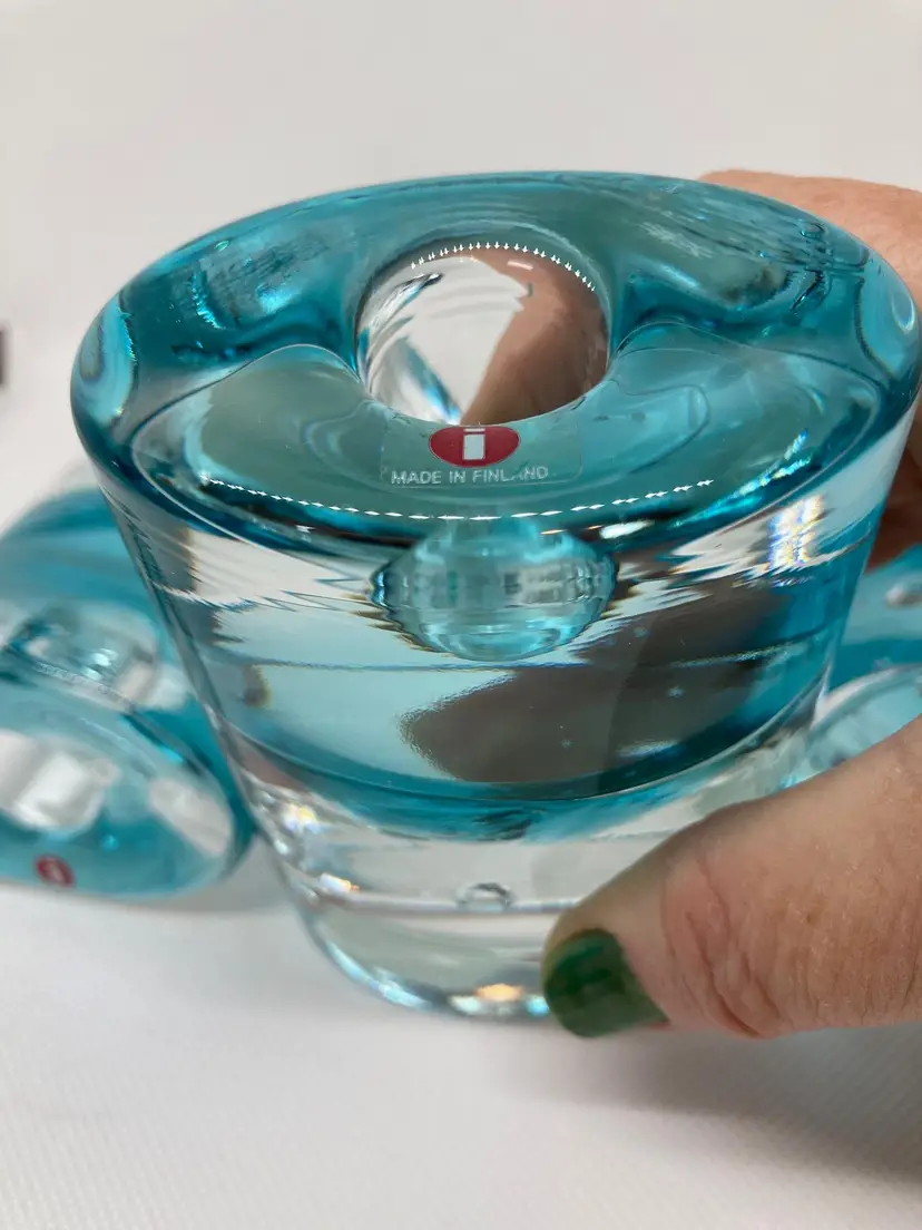Teal set of candle holders made by Iittala